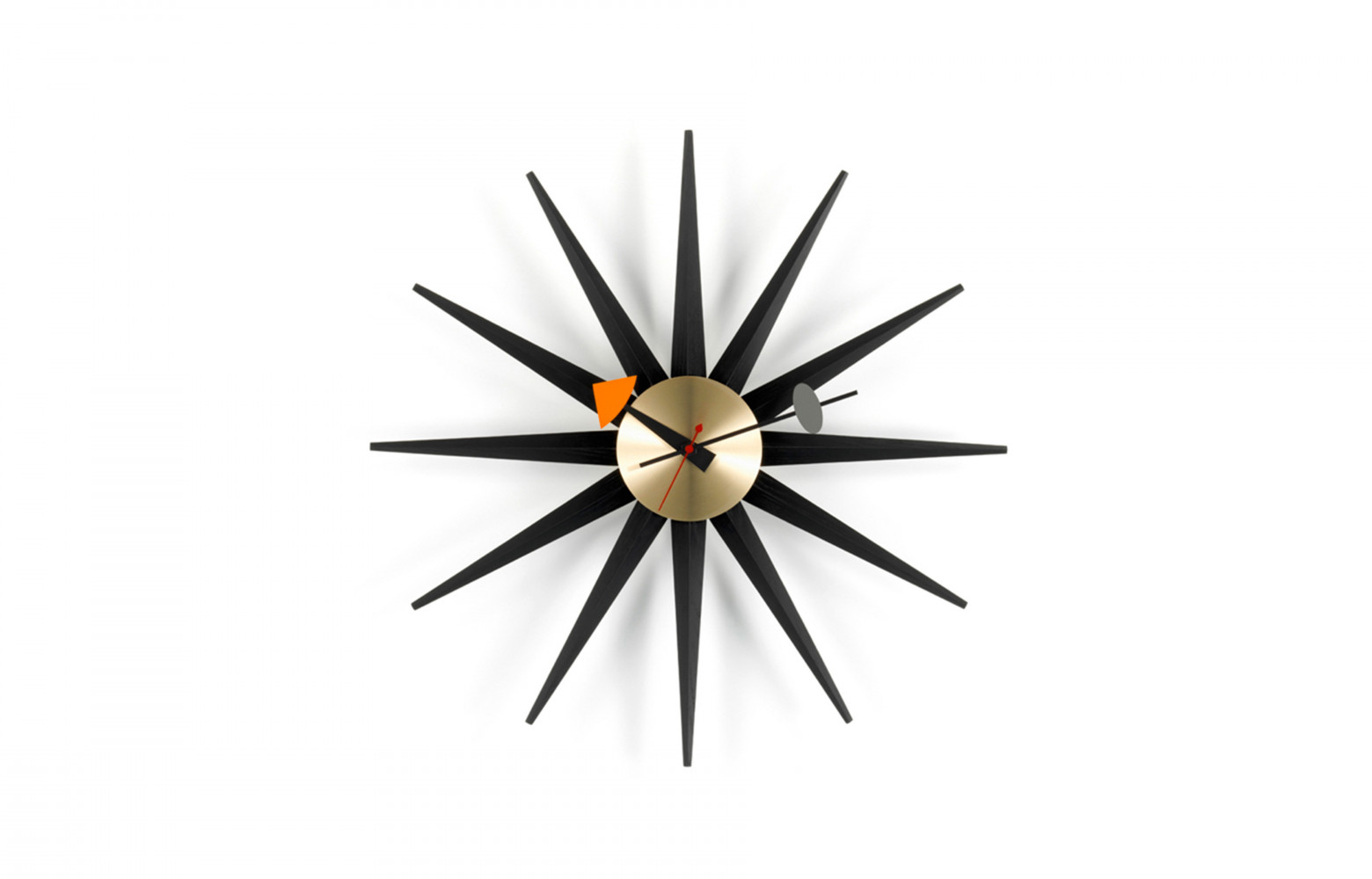 Horloge "Sunburst" (1950) en frêne noir et cadran en laiton, design George Nelson, 382 €. Vitra.