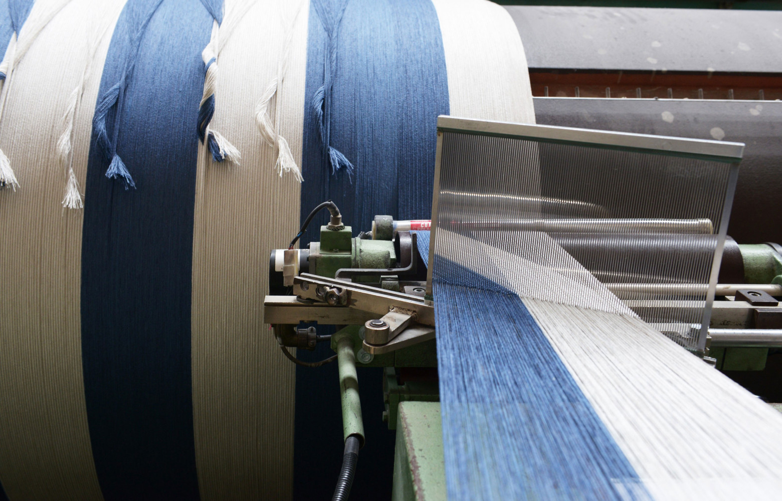 L’ourdissoir sectionnel permet de réaliser une chaîne qui contient des milliers de fils parallèles enroulés sur un...