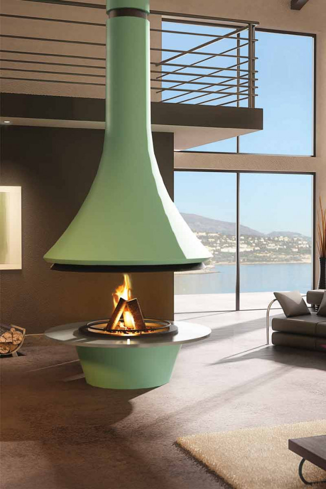 Modèle iconique de la marque, cette cheminée centrale, en acier avec plateau de verre, est constituée d’un...