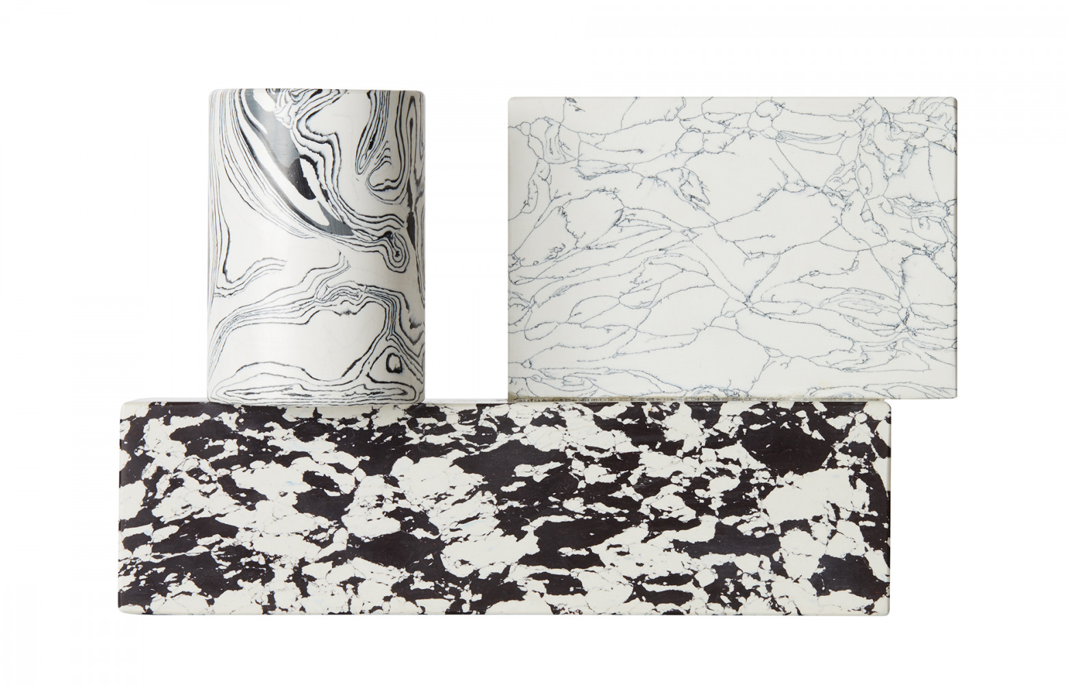 Chandelier Swirl en poudre de marbre recyclée avec pigments et résine, 350 €. Tom Dixon chez ATù.