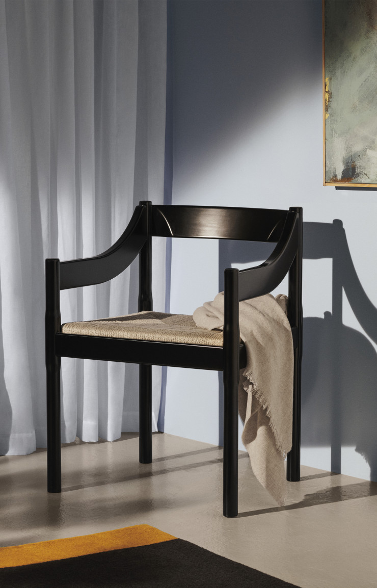 Nouveau fauteuil Carimate noir de Vico Magistretti par Fritz Hansen.