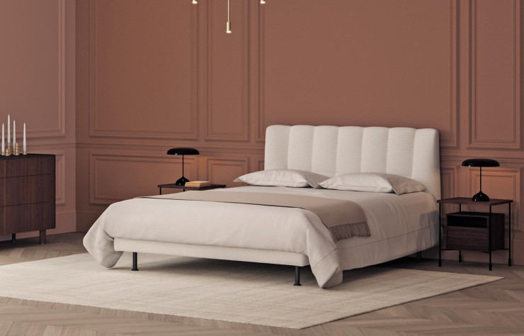 EVISA – Un lit confortable et précieux conçu par Philippe Nigro avec une tête de lit élégante rappelant le style art déco.