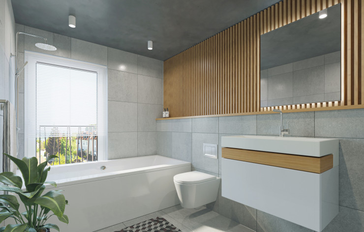 Une salle de bain avec un revêtement mural en tasseaux de bois.