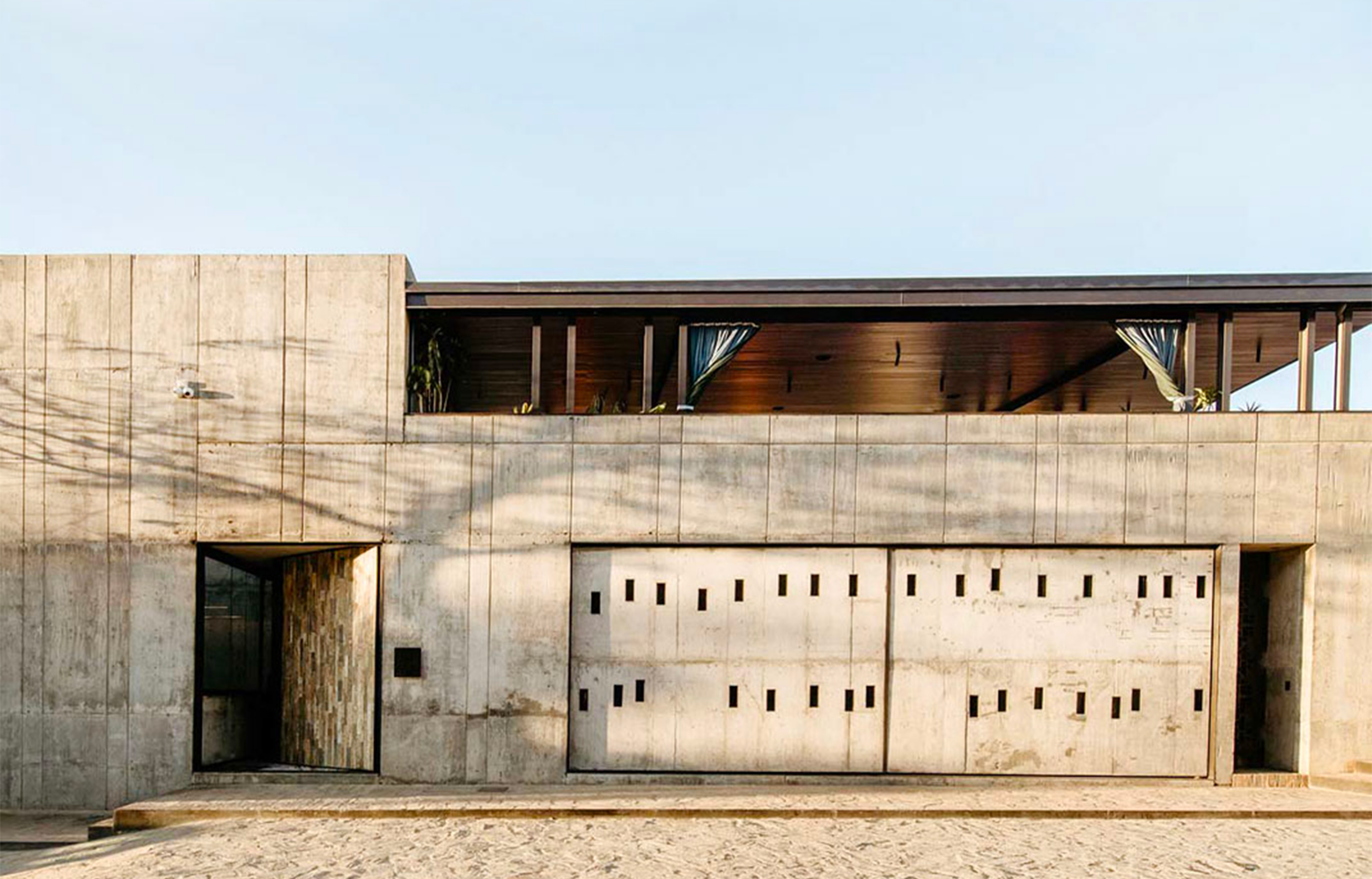 Hôtel Flavia : Brutalisme chaleureux à la périphérie de la ville